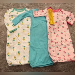 3 baby gowns